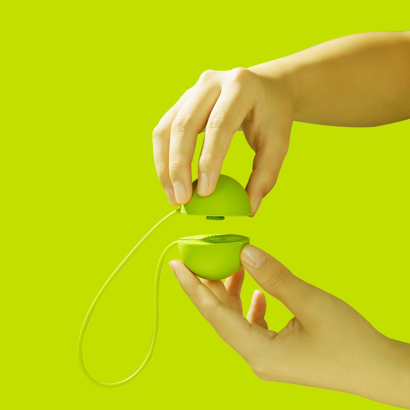 A hand adding a hand soap refill tablet to a hand soap bottle