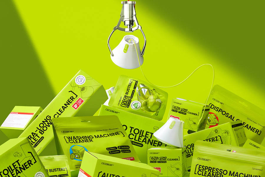 Hand holding a white dishwasher tablet against a blue sky background